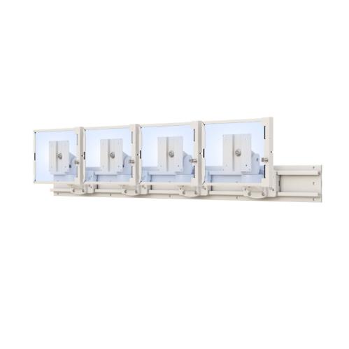 Space-saving vertical design of 4 Tablet Holder on institutional wall